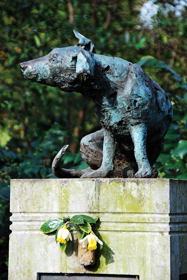 1985 Brown Dog Statue (by Nicola Hicks) with plinth in Battersea Park