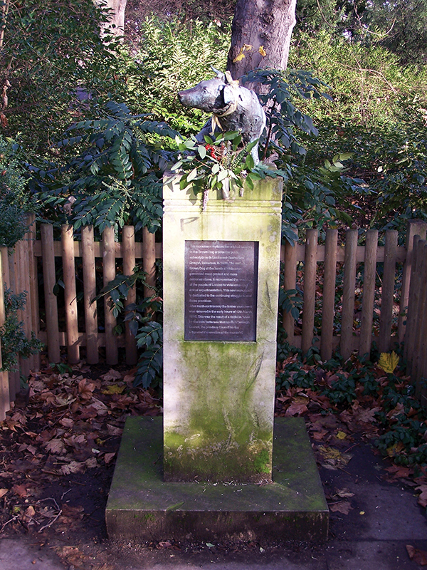 1985 Brown Dog Statue (by Nicola Hicks) with plinth in Battersea Park