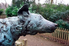 1985 Brown Dog Statue (by Nicola Hicks) with plinth in Battersea Park