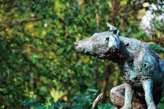 1985 Brown Dog Statue (by Nicola Hicks) with plinth in Battersea Park