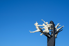 Flight of the Langoustine, by Pierre Diamantopoulo MRSS. It is made of four life-size bronze figures flying through a steel grid. It was inspired by a discarded and mangled lobster pot that the artist had found on Brighton beach. In his imagination, the washed-up object that had seemingly helped the lobsters escape, translated itself into a wider story of human exodus and release – a dash for freedom. Diamantopoulo describes the figures as “at once profound, frivolous and boisterous, occupying the air like a flock of birds and inspired by modern dance choreography”. Bronze casting at Milwyn Foundry and fabrication of the steel grid and assembly by Art Fabrications. The sculpture weighs 2.2 tonnes and measures approximately 3.5 metres high and 3 meters wide. Flight of the Langoustine was inaugurated on the Hove Plinth on 17 September 2023. Flight of the Langoustine, by Pierre Diamantopoulo MRSS. It is made of four life-size bronze figures flying through a steel grid. It was inspired by a discarded and mangled lobster pot that the artist had found on Brighton beach. In his imagination, the washed-up object that had seemingly helped the lobsters escape, translated itself into a wider story of human exodus and release – a dash for freedom. Diamantopoulo describes the figures as “at once profound, frivolous and boisterous, occupying the air like a flock of birds and inspired by modern dance choreography”. Bronze casting at Milwyn Foundry and fabrication of the steel grid and assembly by Art Fabrications. The sculpture weighs 2.2 tonnes and measures approximately 3.5 metres high and 3 meters wide. Flight of the Langoustine was inaugurated on the Hove Plinth on 17 September 2023.