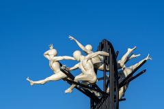 Flight of the Langoustine, by Pierre Diamantopoulo MRSS. It is made of four life-size bronze figures flying through a steel grid. It was inspired by a discarded and mangled lobster pot that the artist had found on Brighton beach. In his imagination, the washed-up object that had seemingly helped the lobsters escape, translated itself into a wider story of human exodus and release – a dash for freedom. Diamantopoulo describes the figures as “at once profound, frivolous and boisterous, occupying the air like a flock of birds and inspired by modern dance choreography”. Bronze casting at Milwyn Foundry and fabrication of the steel grid and assembly by Art Fabrications. The sculpture weighs 2.2 tonnes and measures approximately 3.5 metres high and 3 meters wide. Flight of the Langoustine was inaugurated on the Hove Plinth on 17 September 2023. Flight of the Langoustine, by Pierre Diamantopoulo MRSS. It is made of four life-size bronze figures flying through a steel grid. It was inspired by a discarded and mangled lobster pot that the artist had found on Brighton beach. In his imagination, the washed-up object that had seemingly helped the lobsters escape, translated itself into a wider story of human exodus and release – a dash for freedom. Diamantopoulo describes the figures as “at once profound, frivolous and boisterous, occupying the air like a flock of birds and inspired by modern dance choreography”. Bronze casting at Milwyn Foundry and fabrication of the steel grid and assembly by Art Fabrications. The sculpture weighs 2.2 tonnes and measures approximately 3.5 metres high and 3 meters wide. Flight of the Langoustine was inaugurated on the Hove Plinth on 17 September 2023.