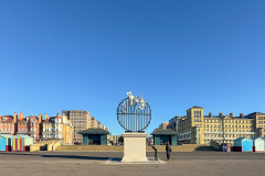 Flight of the Langoustine, by Pierre Diamantopoulo MRSS. It is made of four life-size bronze figures flying through a steel grid. It was inspired by a discarded and mangled lobster pot that the artist had found on Brighton beach. In his imagination, the washed-up object that had seemingly helped the lobsters escape, translated itself into a wider story of human exodus and release – a dash for freedom. Diamantopoulo describes the figures as “at once profound, frivolous and boisterous, occupying the air like a flock of birds and inspired by modern dance choreography”. Bronze casting at Milwyn Foundry and fabrication of the steel grid and assembly by Art Fabrications. The sculpture weighs 2.2 tonnes and measures approximately 3.5 metres high and 3 meters wide. Flight of the Langoustine was inaugurated on the Hove Plinth on 17 September 2023. Flight of the Langoustine, by Pierre Diamantopoulo MRSS. It is made of four life-size bronze figures flying through a steel grid. It was inspired by a discarded and mangled lobster pot that the artist had found on Brighton beach. In his imagination, the washed-up object that had seemingly helped the lobsters escape, translated itself into a wider story of human exodus and release – a dash for freedom. Diamantopoulo describes the figures as “at once profound, frivolous and boisterous, occupying the air like a flock of birds and inspired by modern dance choreography”. Bronze casting at Milwyn Foundry and fabrication of the steel grid and assembly by Art Fabrications. The sculpture weighs 2.2 tonnes and measures approximately 3.5 metres high and 3 meters wide. Flight of the Langoustine was inaugurated on the Hove Plinth on 17 September 2023.